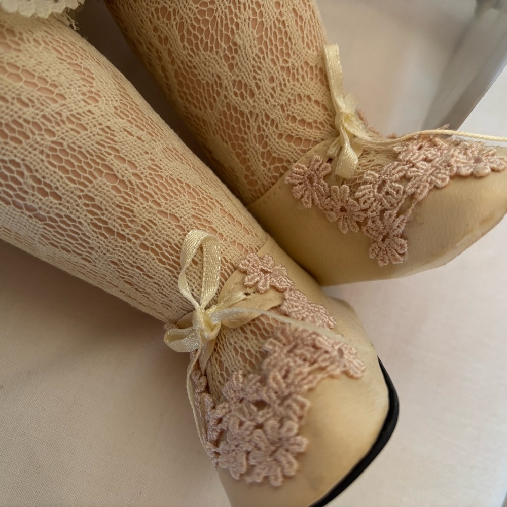 Elegant Pink and Cream Porcelain Doll - Picture 7 of 11